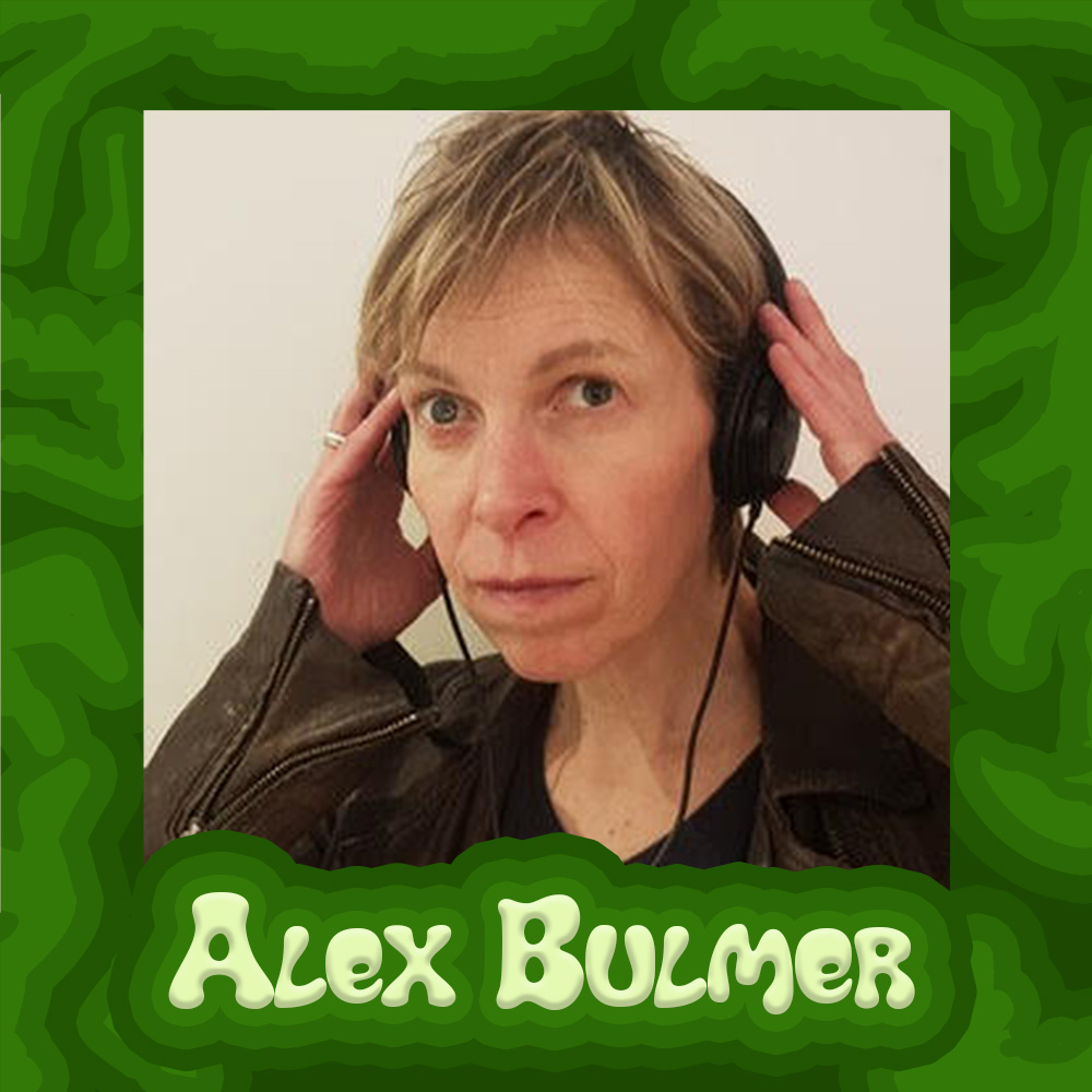 Alex Bulmer is a white woman in her 50s with short sandy blonde hair and blue eyes. She wears a leather jacket and holds earphones to her ears with both hands. Her picture is surrounded by a border of darker greens and her name in light green bubbly letters.